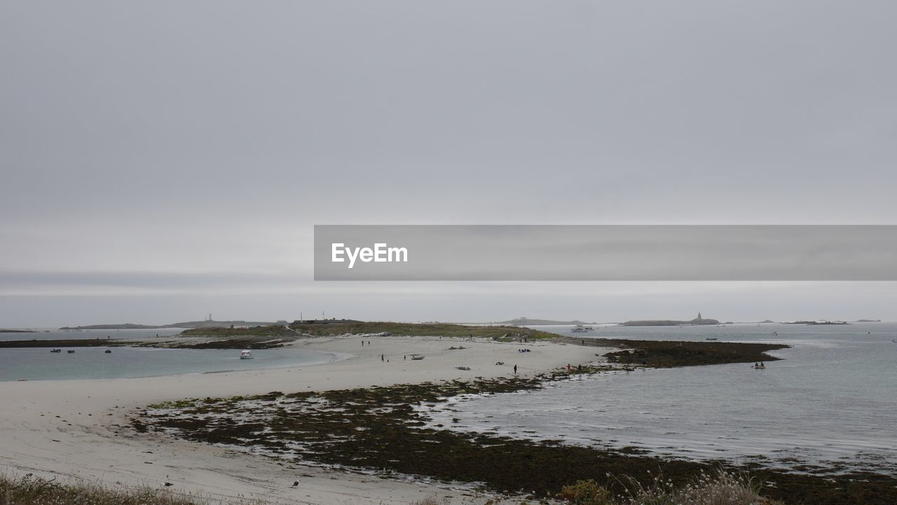 VIEW OF BEACH AGAINST SKY