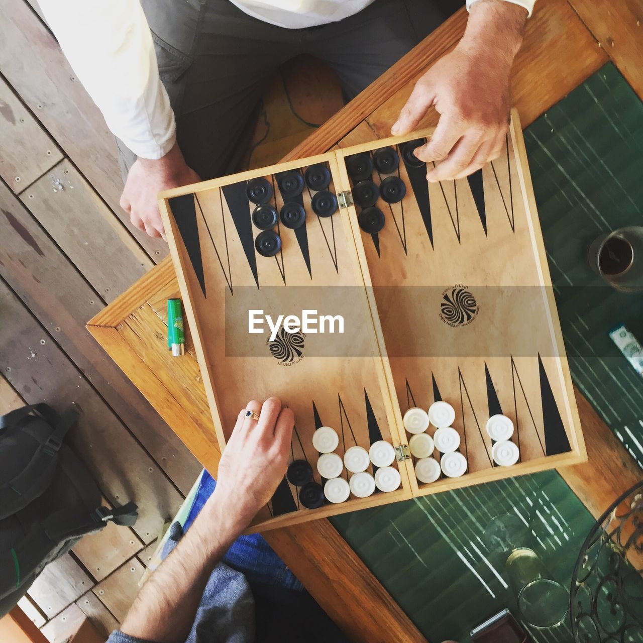 High angle view of men playing backgammon