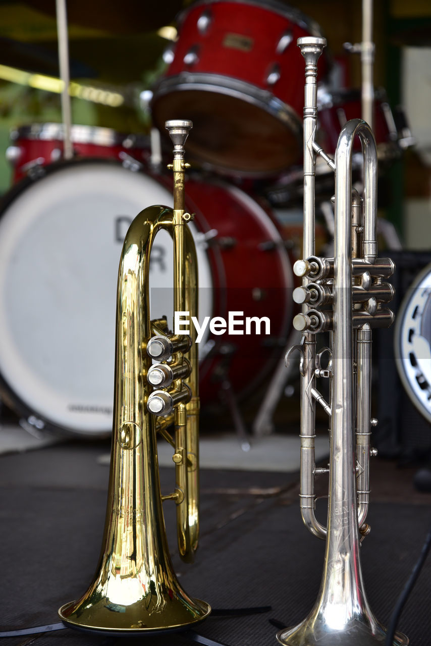 musical instrument, music, arts culture and entertainment, drums, drum, musical equipment, metal, performance, brass instrument, percussion, indoors, no people, drum - percussion instrument, focus on foreground, guitar