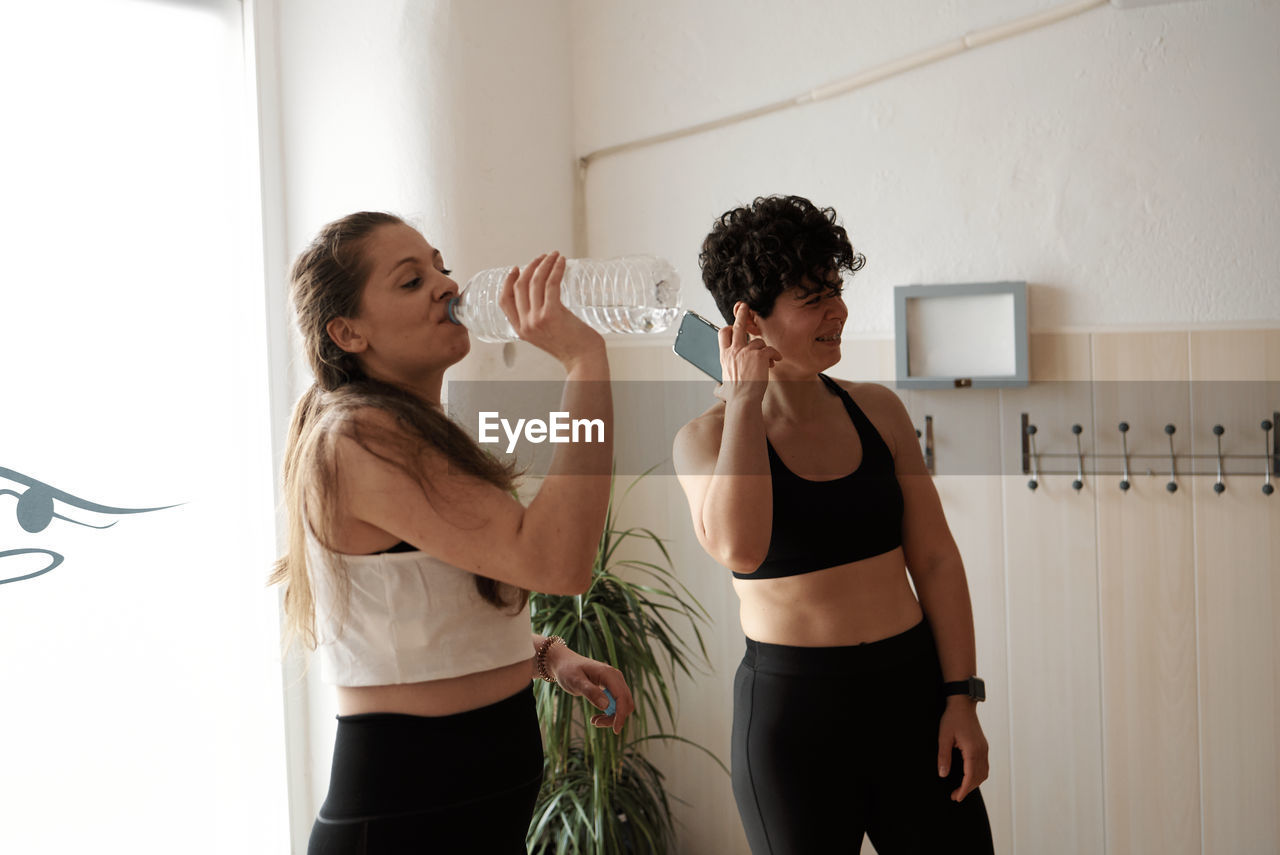 Group of women practicing pilates exercises in class