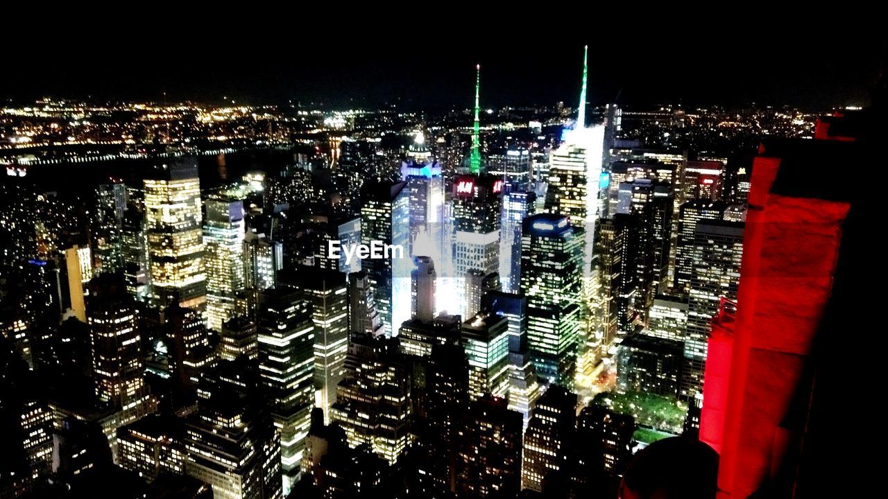 AERIAL VIEW OF ILLUMINATED CITY