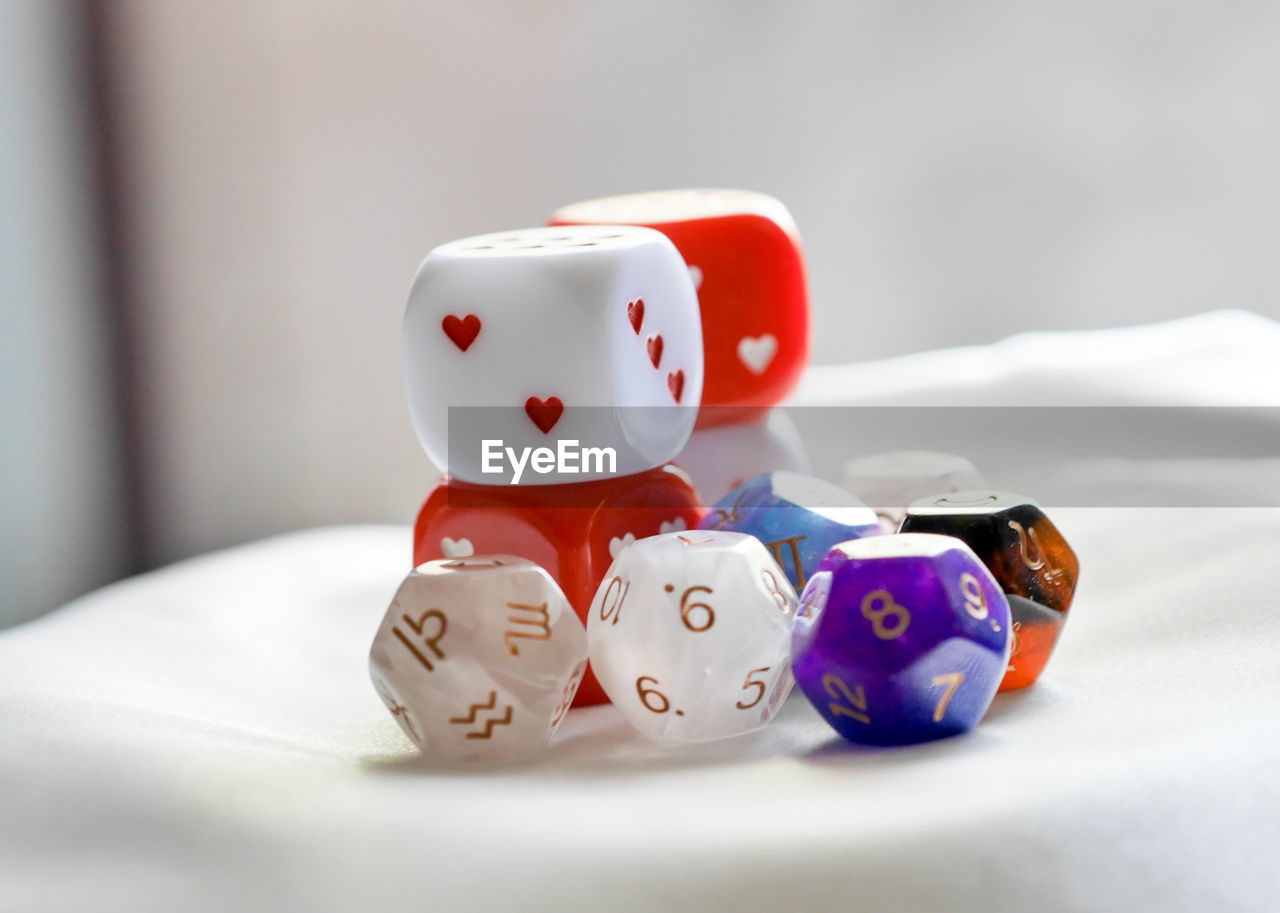 dice, dice game, game, gambling, indoors, luck, no people, indoor games and sports, relaxation, toy, opportunity, board game, leisure games, close-up, still life, tabletop game, cube shape, group of objects, arts culture and entertainment, representation