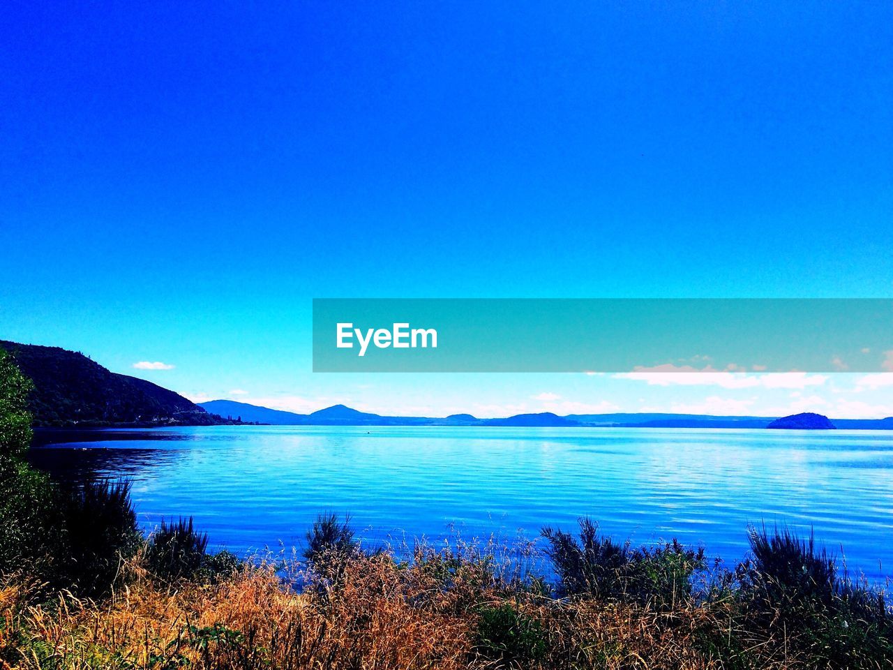 SCENIC VIEW OF SEA AGAINST BLUE SKY