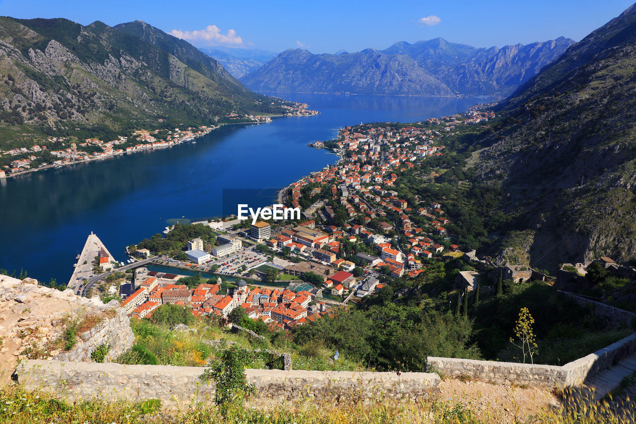 High angle view of houses by mountains