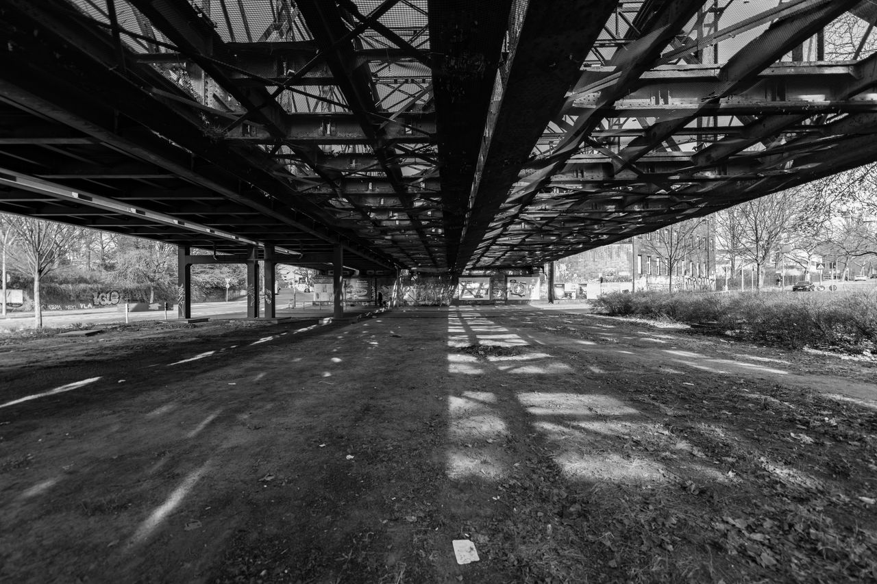 transportation, architecture, built structure, black and white, monochrome, the way forward, bridge, no people, road, day, monochrome photography, transport, diminishing perspective, nature, urban area, outdoors, city, plant, tree, vanishing point, darkness, lane, black, empty