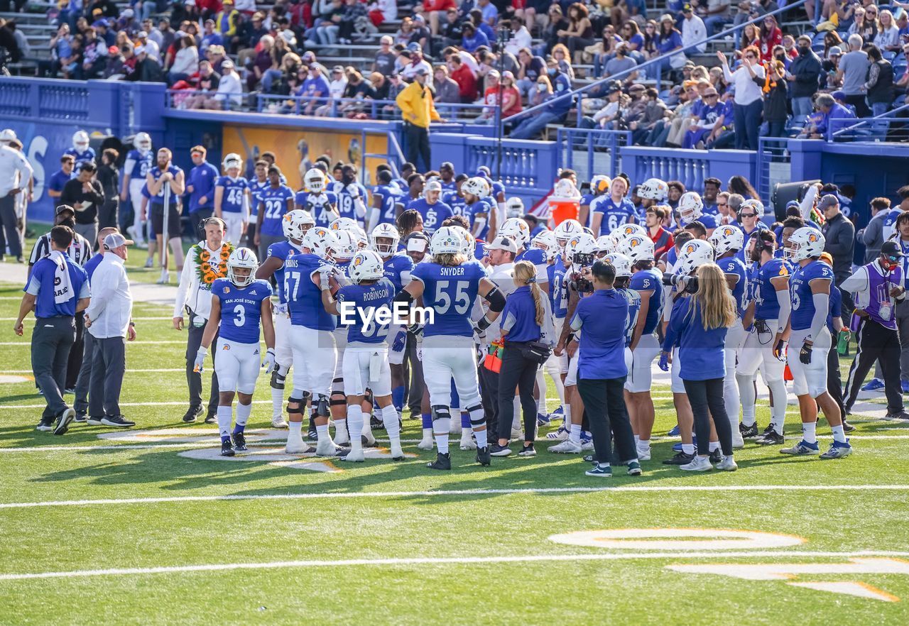 Football team huddle