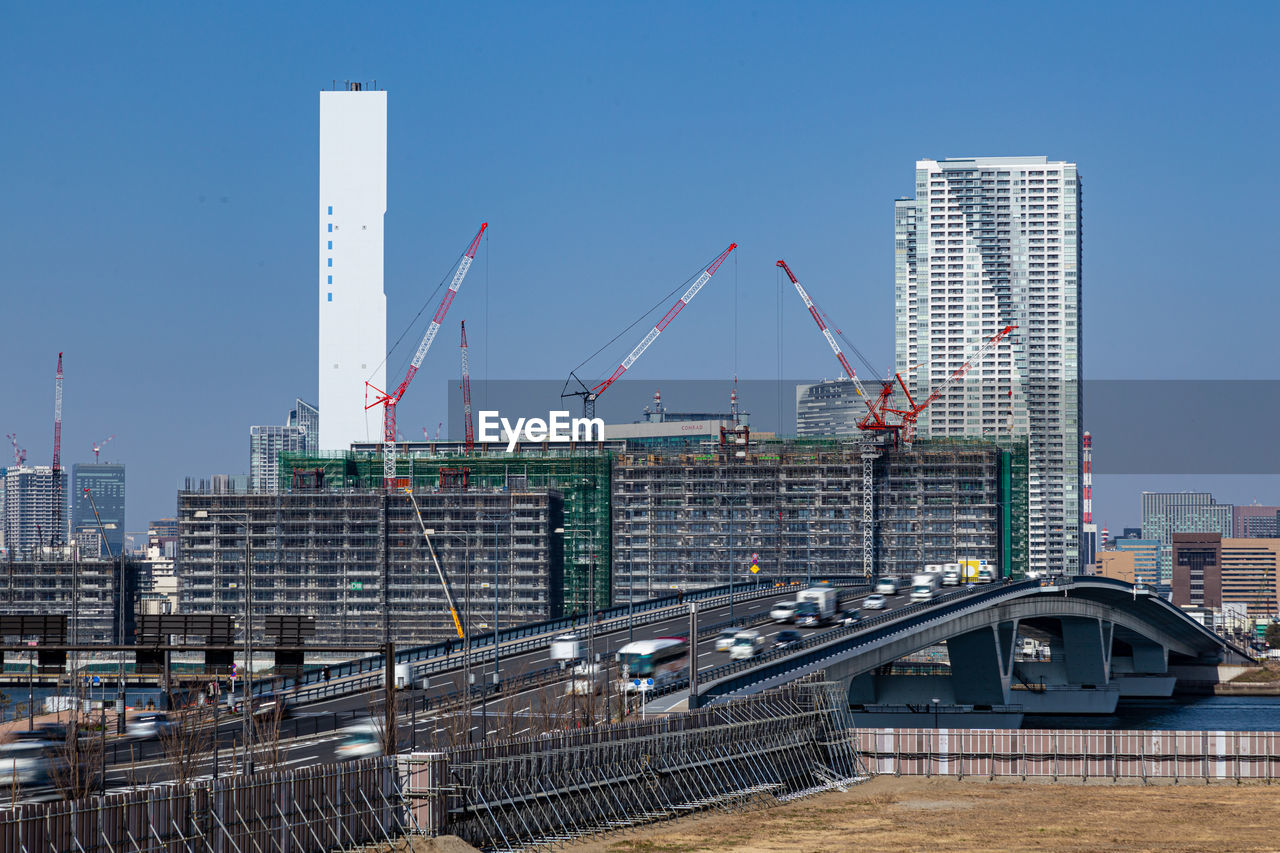 MODERN BUILDINGS AGAINST CLEAR SKY