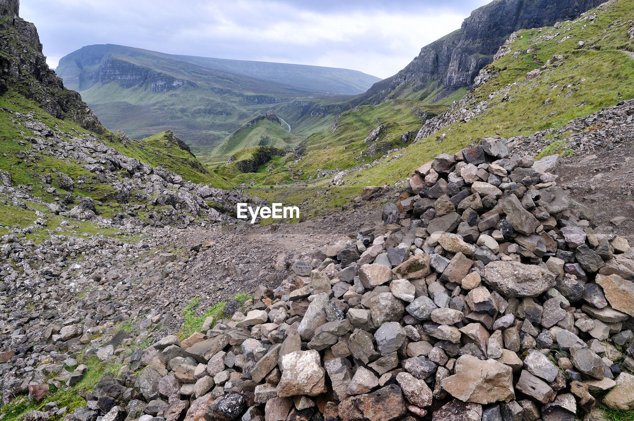 Rocks on land against sky