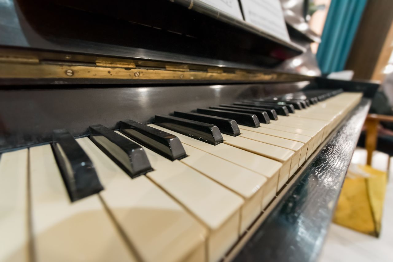 CLOSE-UP OF PIANO