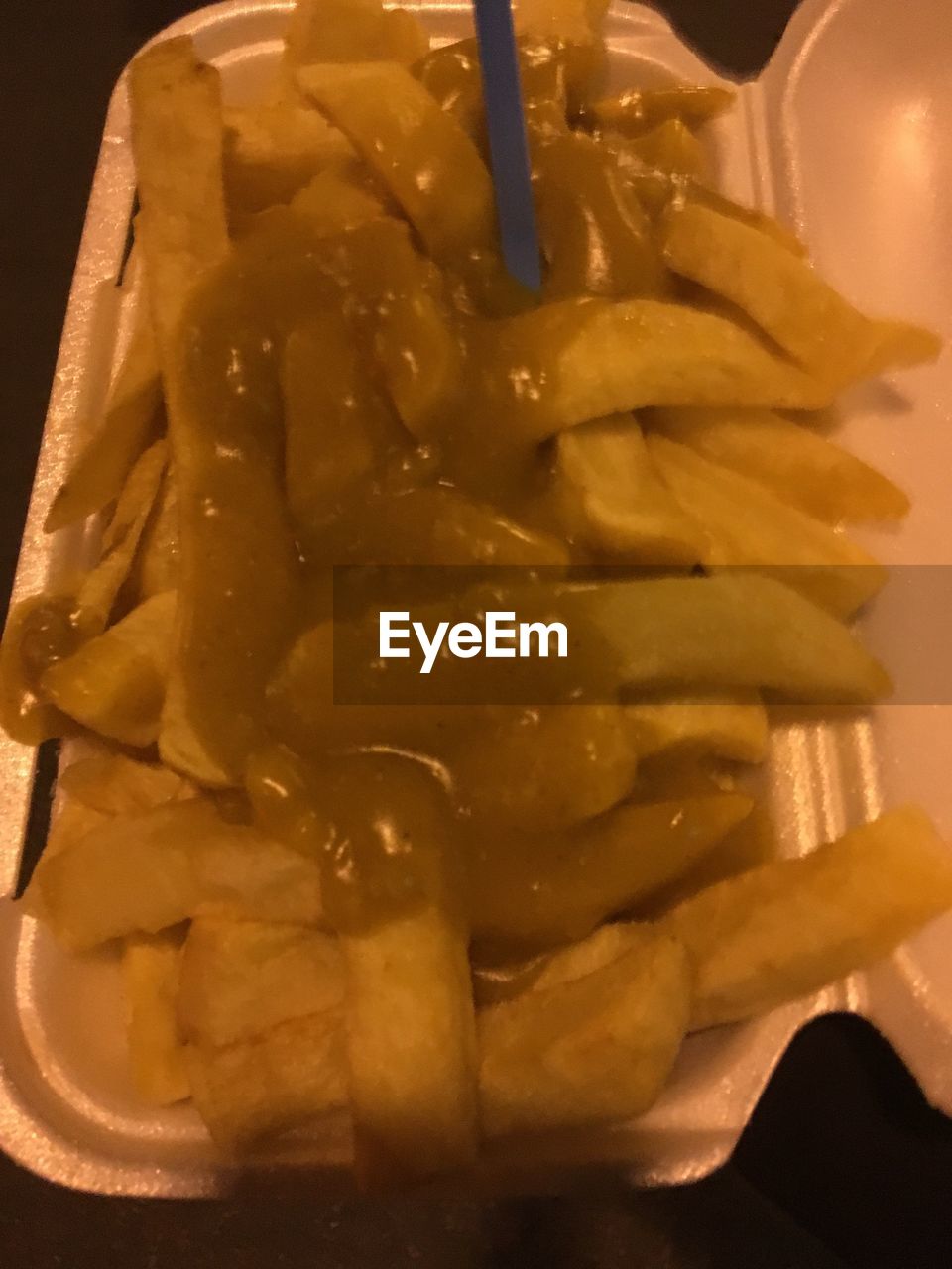 CLOSE-UP OF PREPARING FOOD ON TABLE