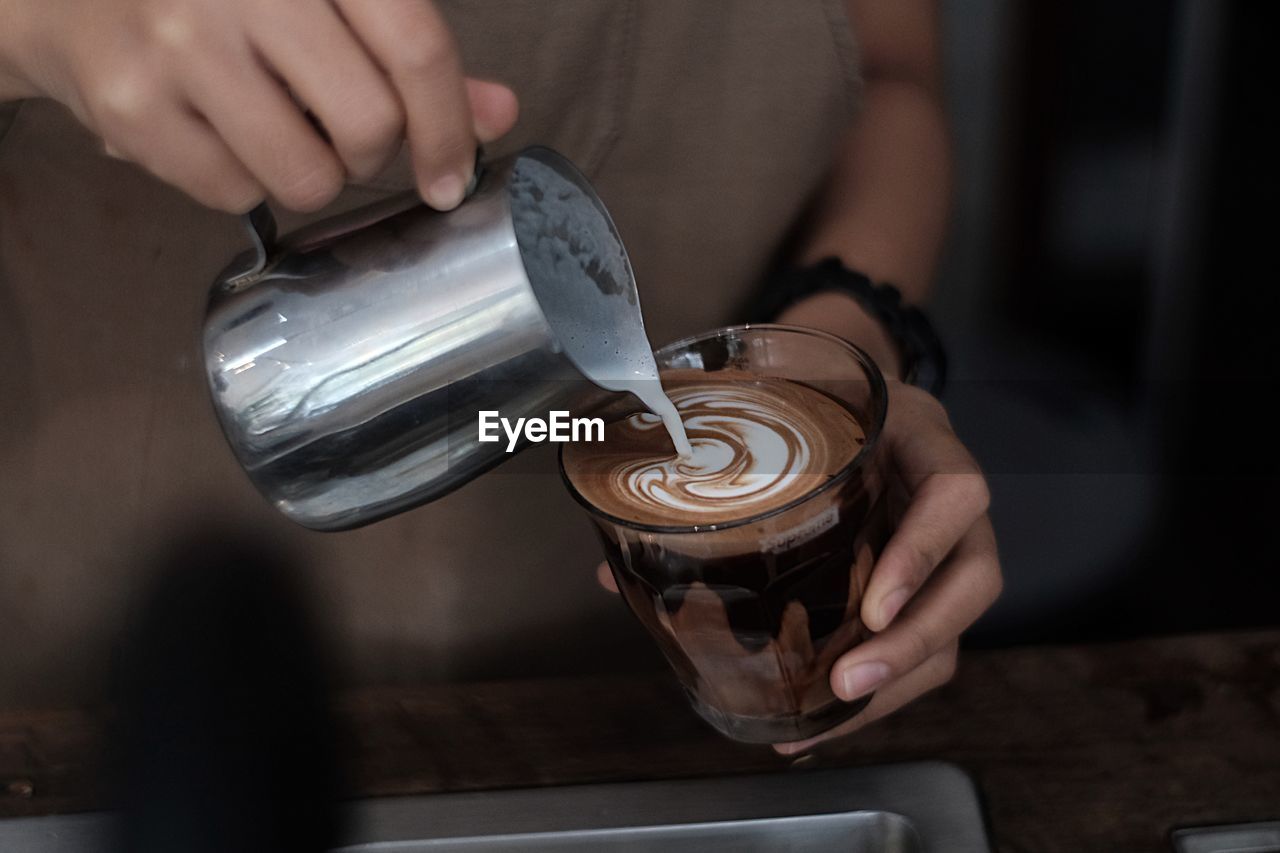 Man holding coffee cup