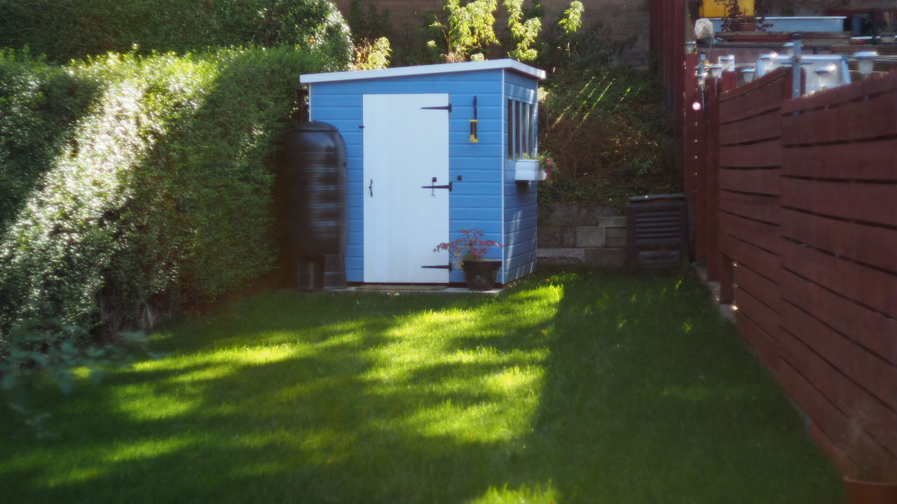 VIEW OF HOUSE WITH GARDEN