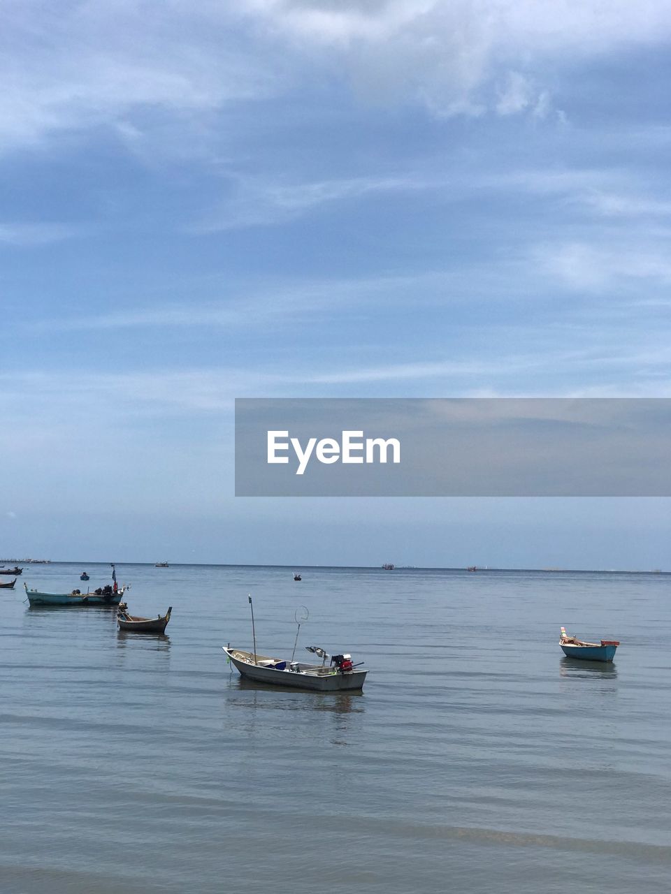 VIEW OF SAILBOAT IN SEA AGAINST SKY