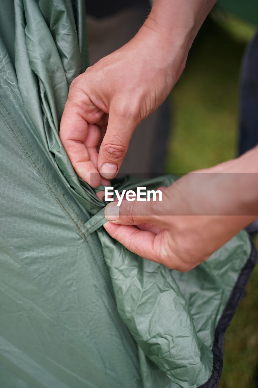 Setting up a tent for camping