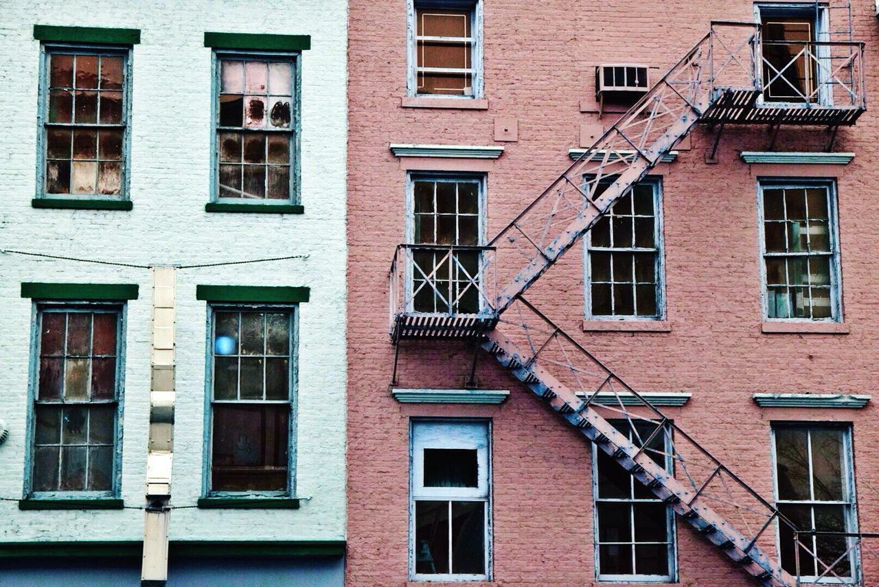 Full frame shot of fire escape on brick wall