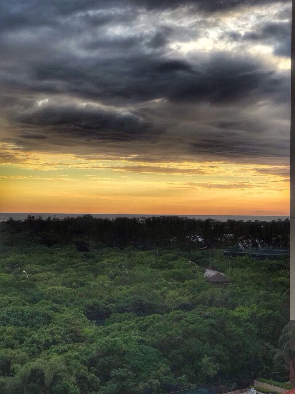 SCENIC VIEW OF LANDSCAPE AGAINST DRAMATIC SKY DURING SUNSET