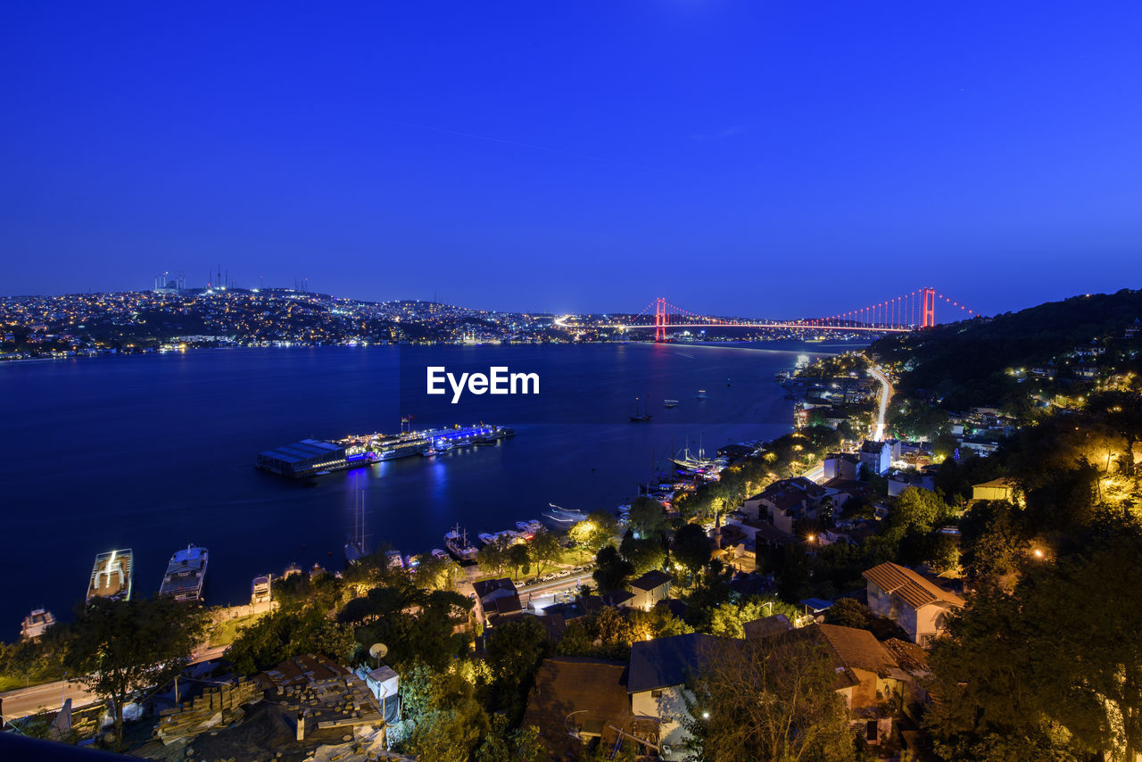 High angle view of illuminated city at night