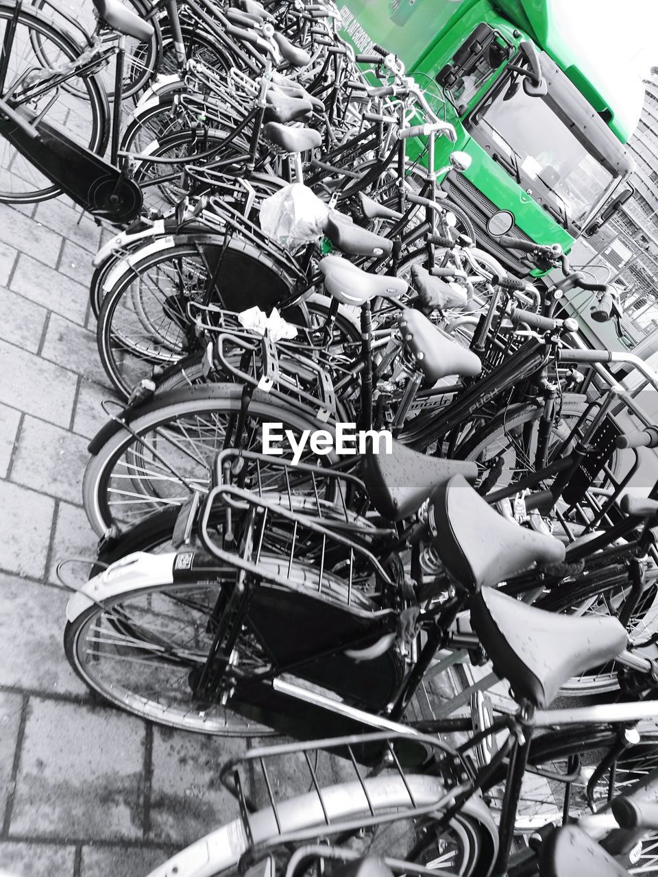 HIGH ANGLE VIEW OF BICYCLES ON METAL