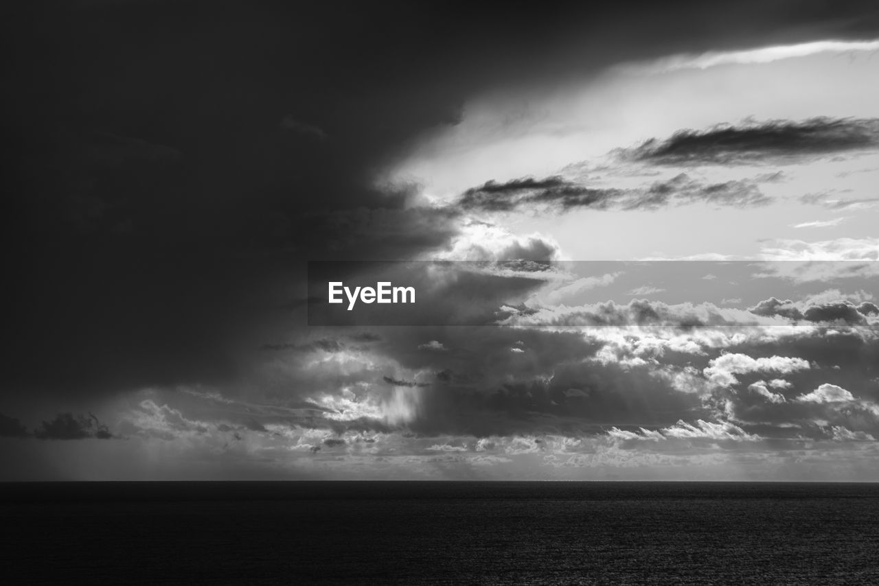 Scenic view of sea against sky at dusk, tigulli gulf, genoa province, italy