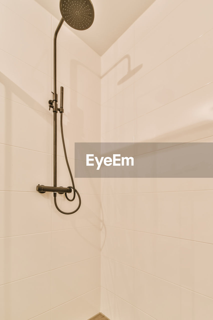 Low angle view of shower in bathroom