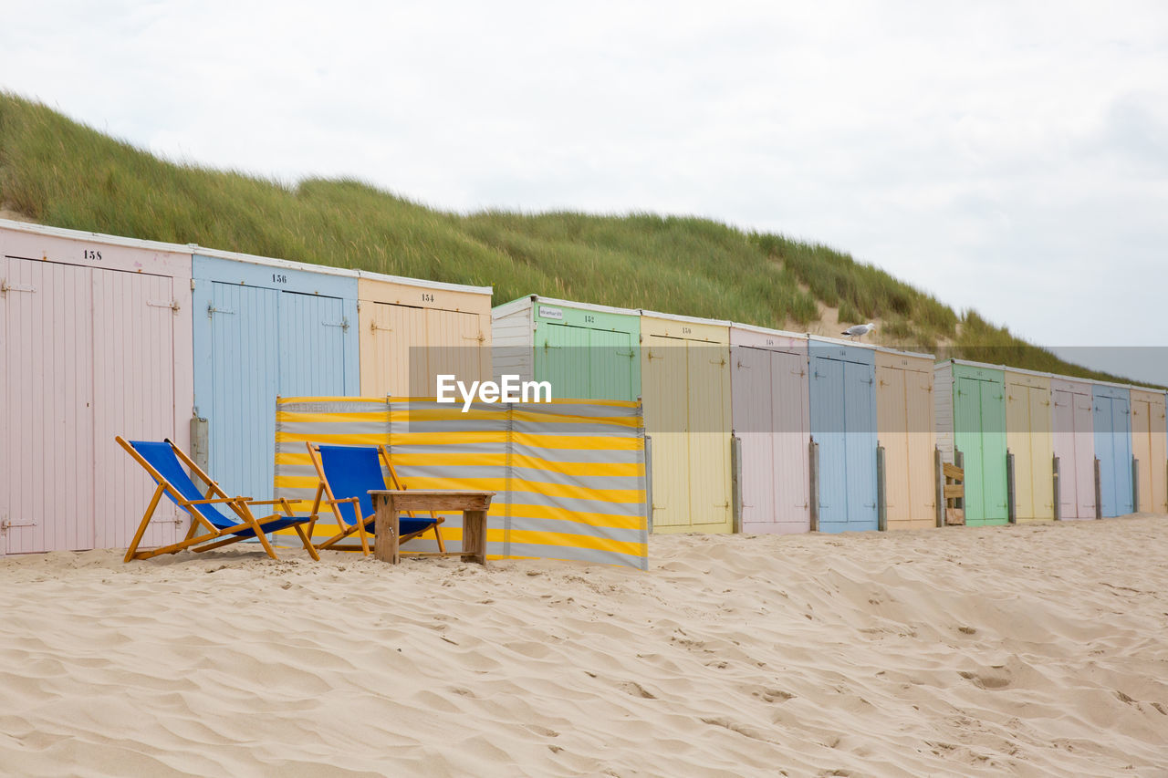 HOODED CHAIRS ON BEACH