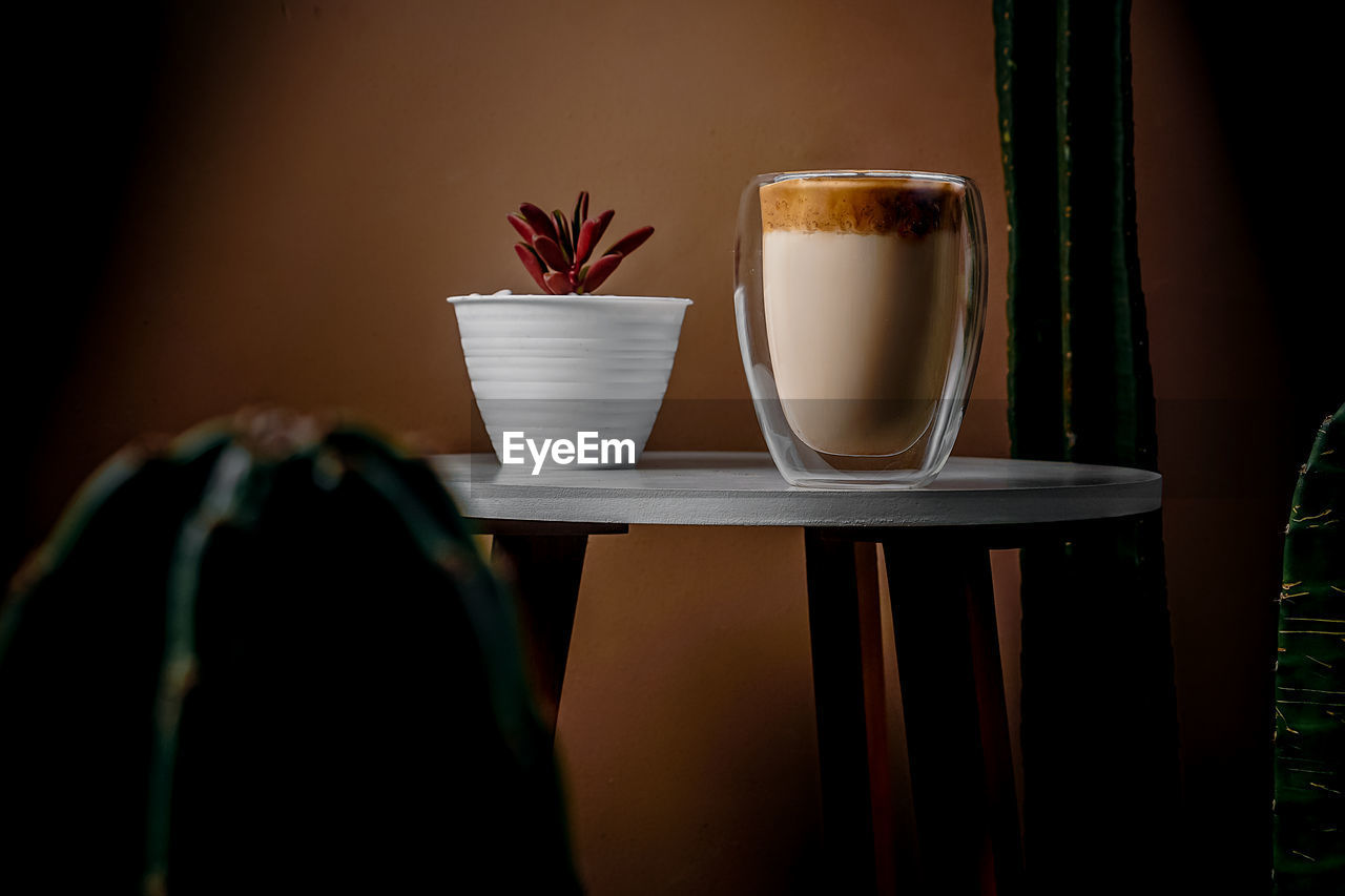 Close-up of coffee cup on table