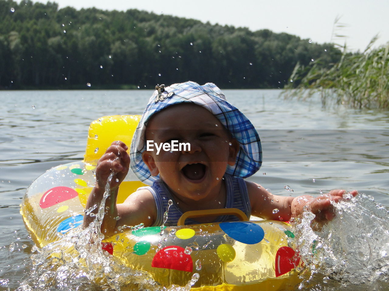 Full length of girl swimming in water