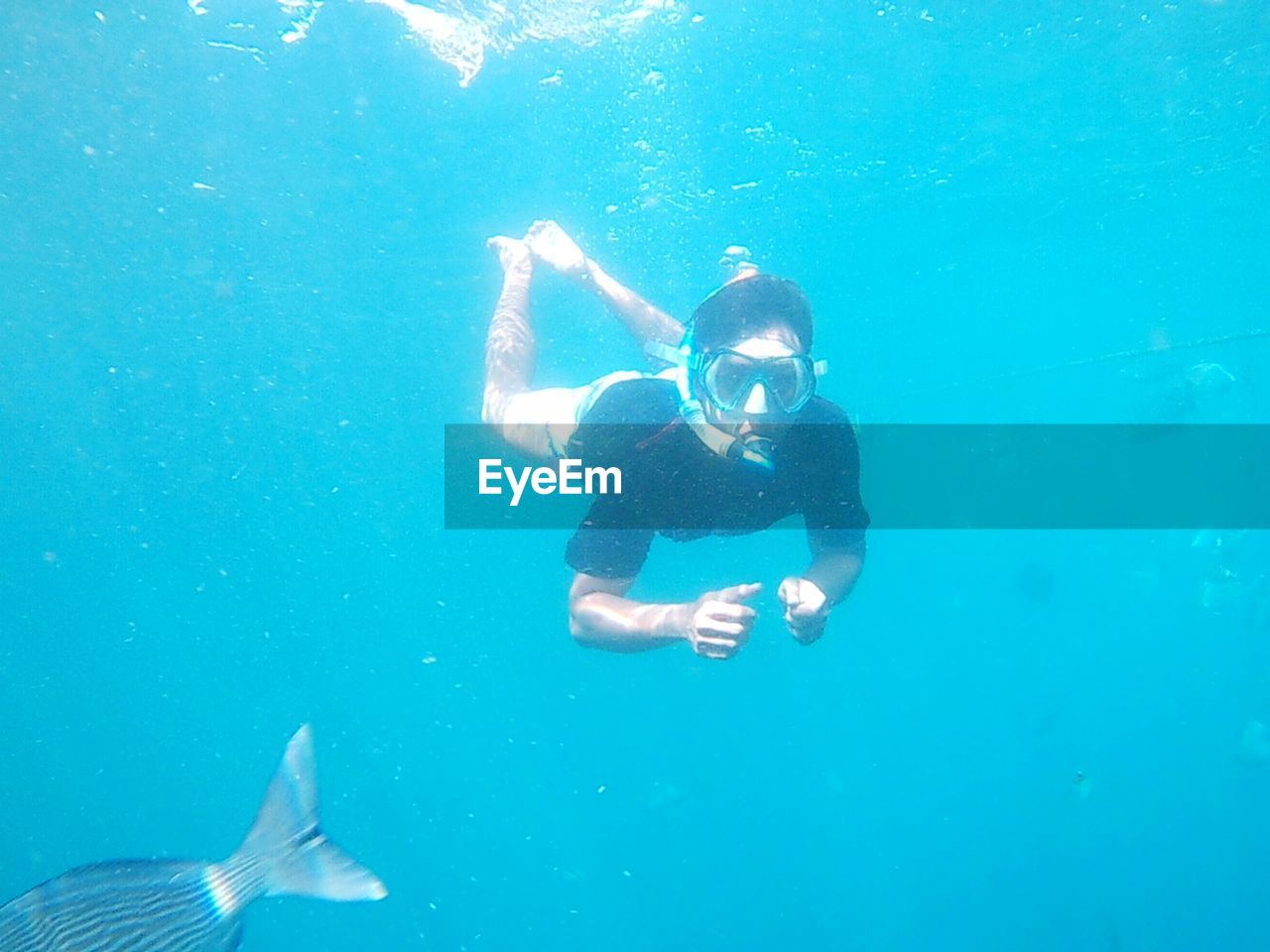 Portrait of man swimming in sea