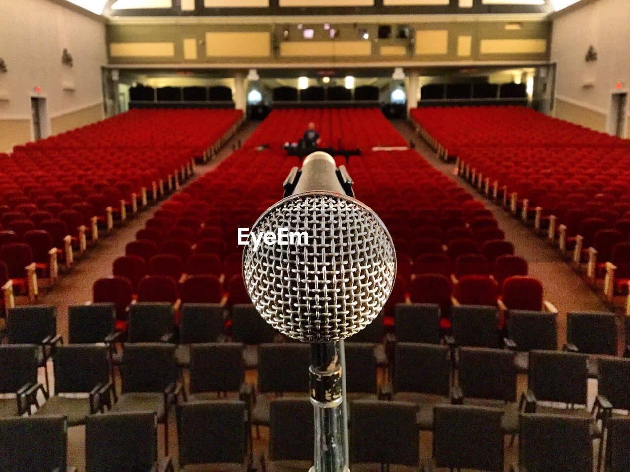 Microphone against empty seats in keswick theatre