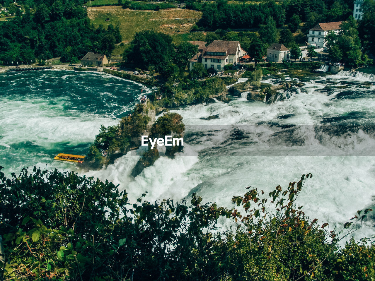 High angle view of sea by trees