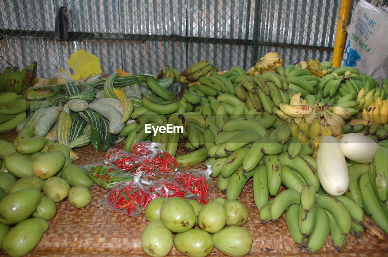 Vegetables and fruits for sale at market stall