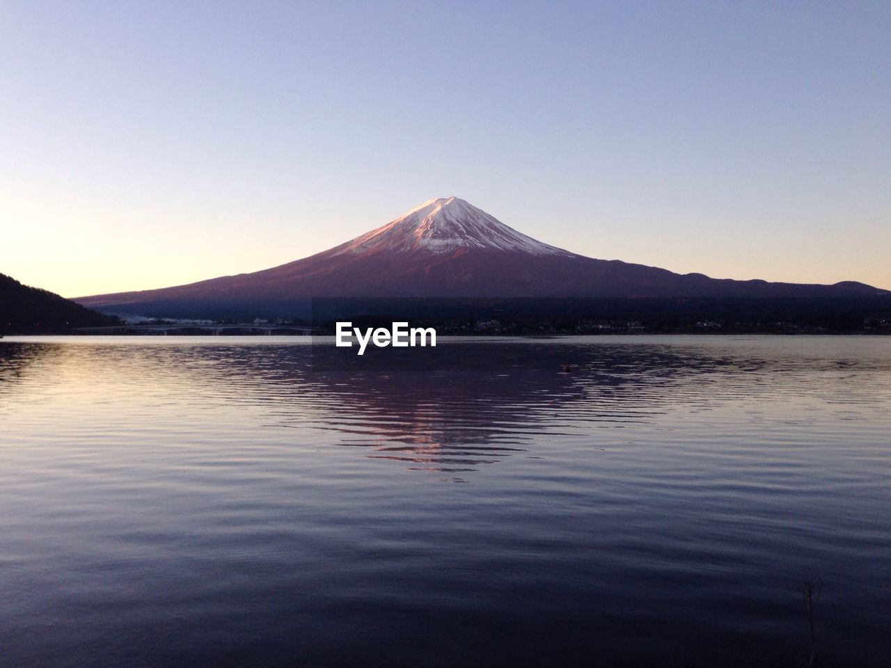 Scenic view of lake kawaguchi and mt fuji against sky