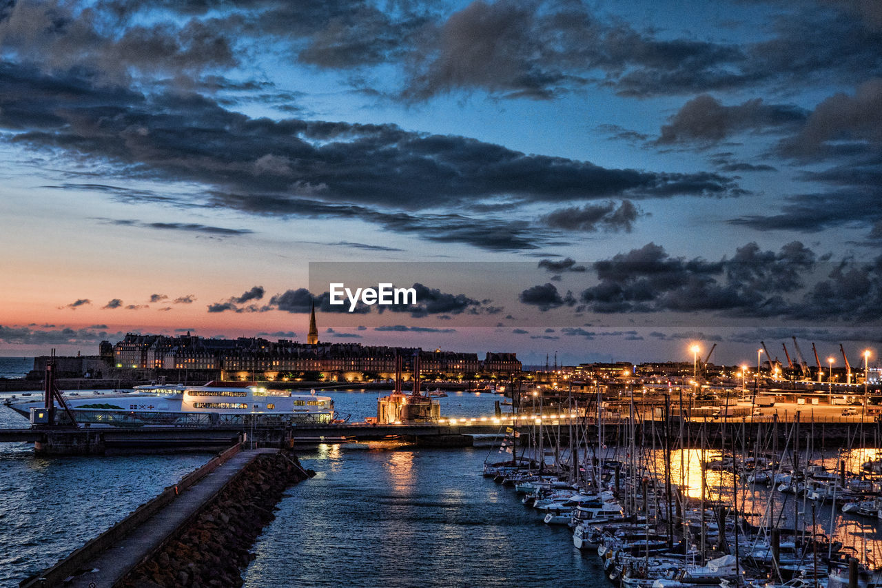 VIEW OF HARBOR AGAINST SKY