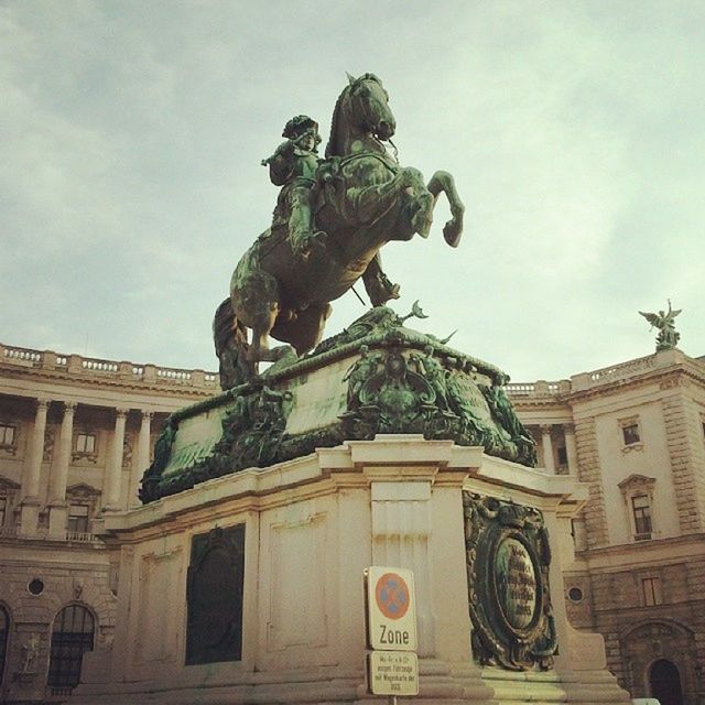 LOW ANGLE VIEW OF STATUE