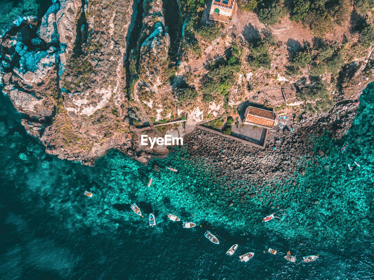 Directly above shot of mountain by sea