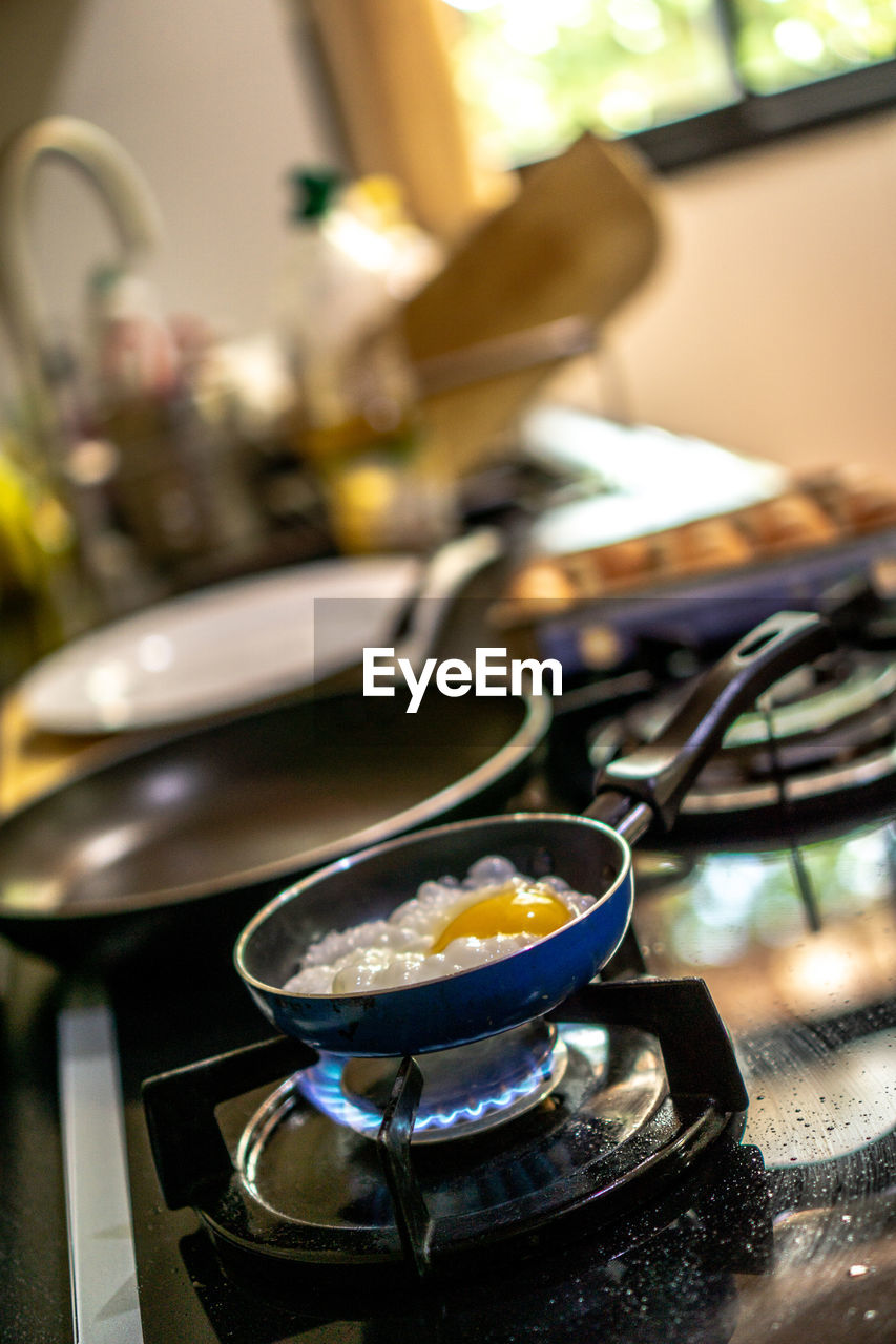 Fried egg in pan on stove