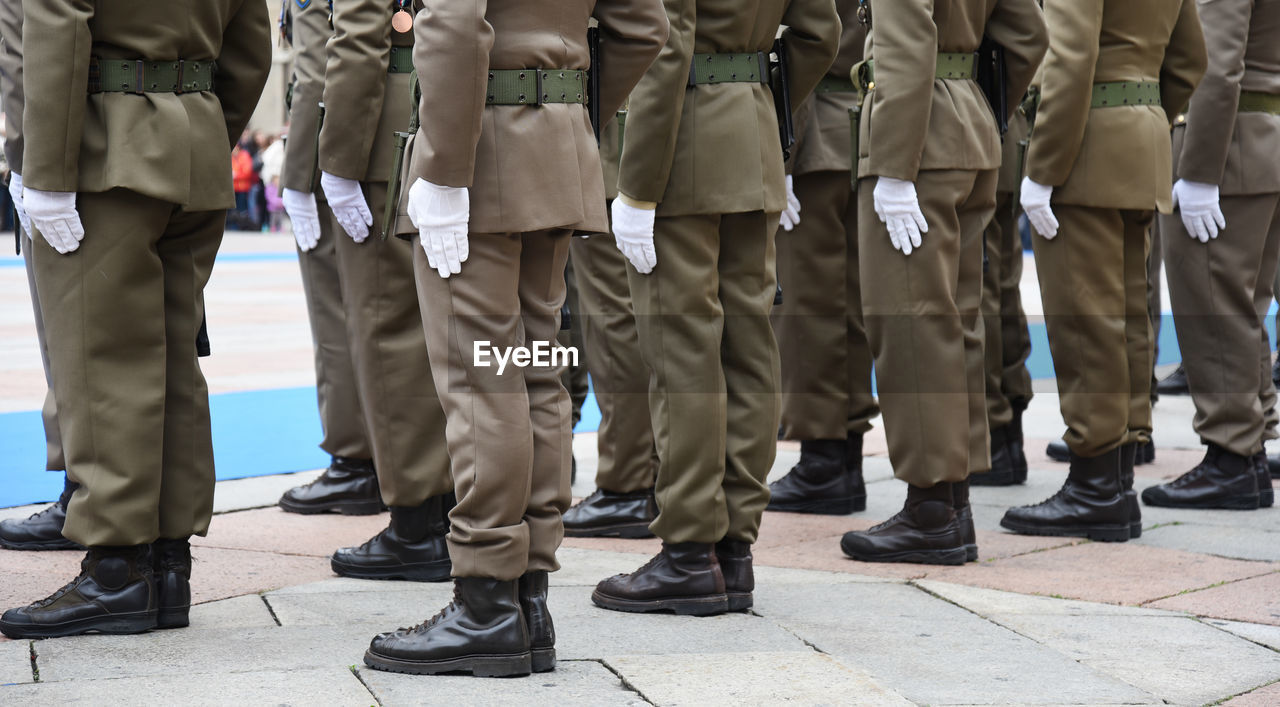 Low section of soldiers standing outdoors