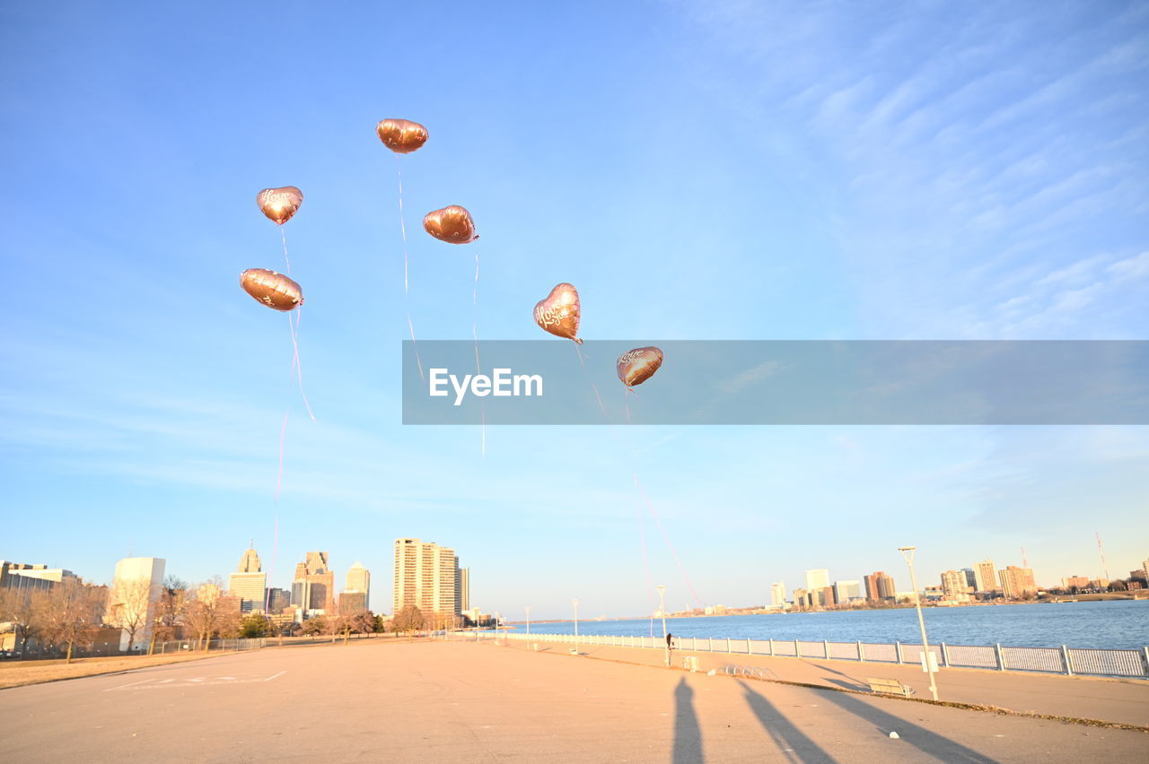 Scenic view of beach against blue sky