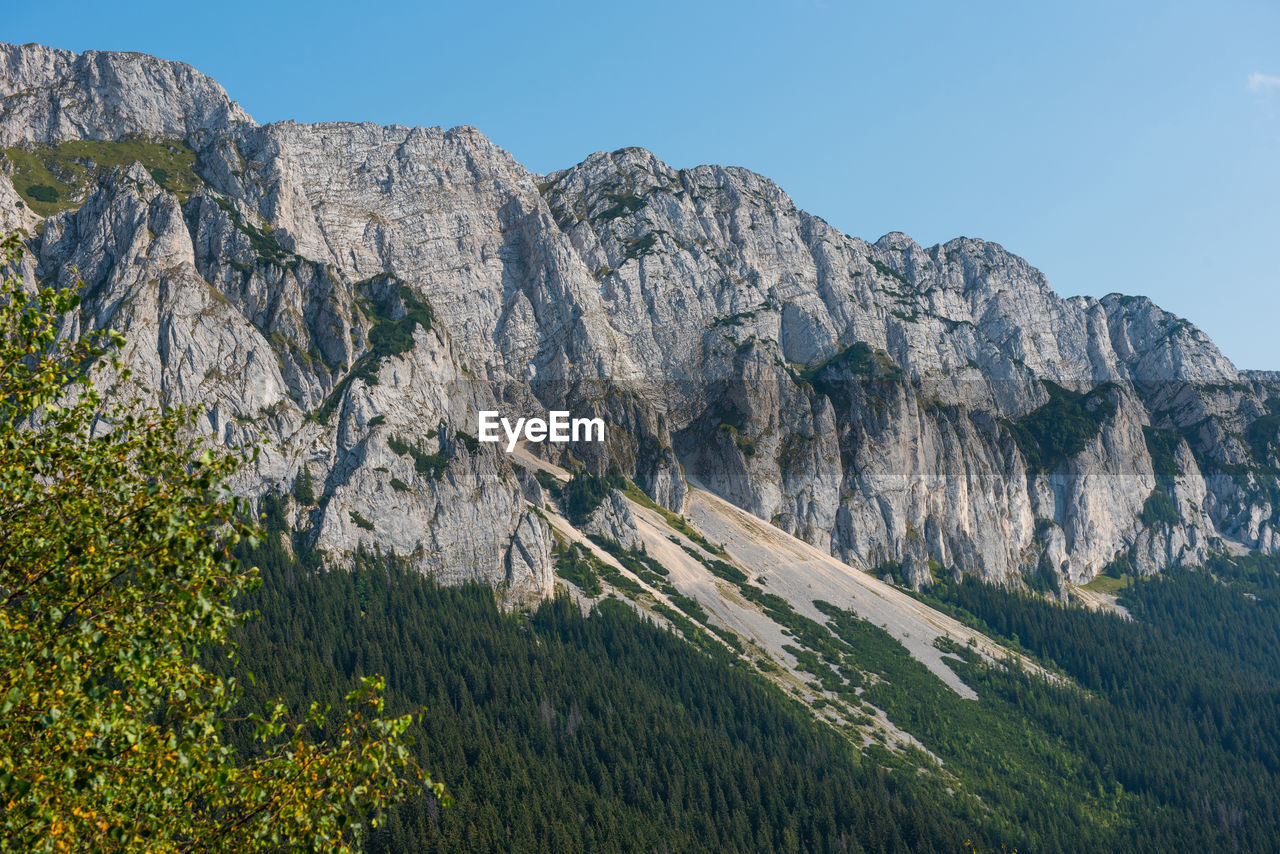 Scenic view of mountains against clear sky