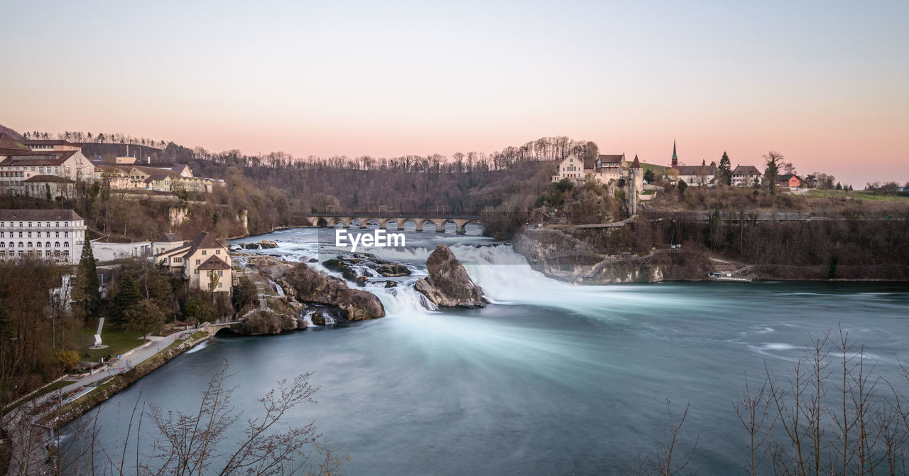 SCENIC VIEW OF RIVER AGAINST CLEAR SKY