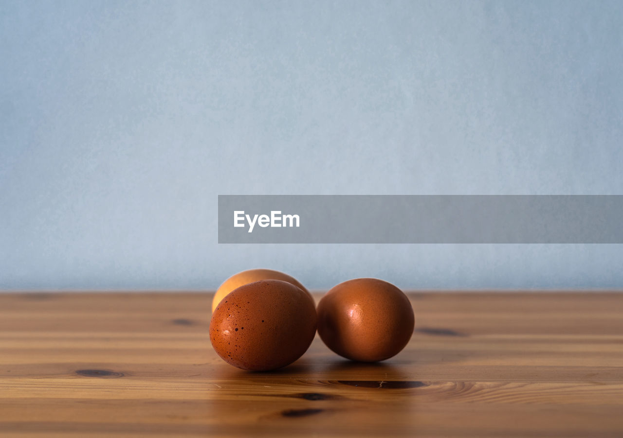 Eggs on a wooden table