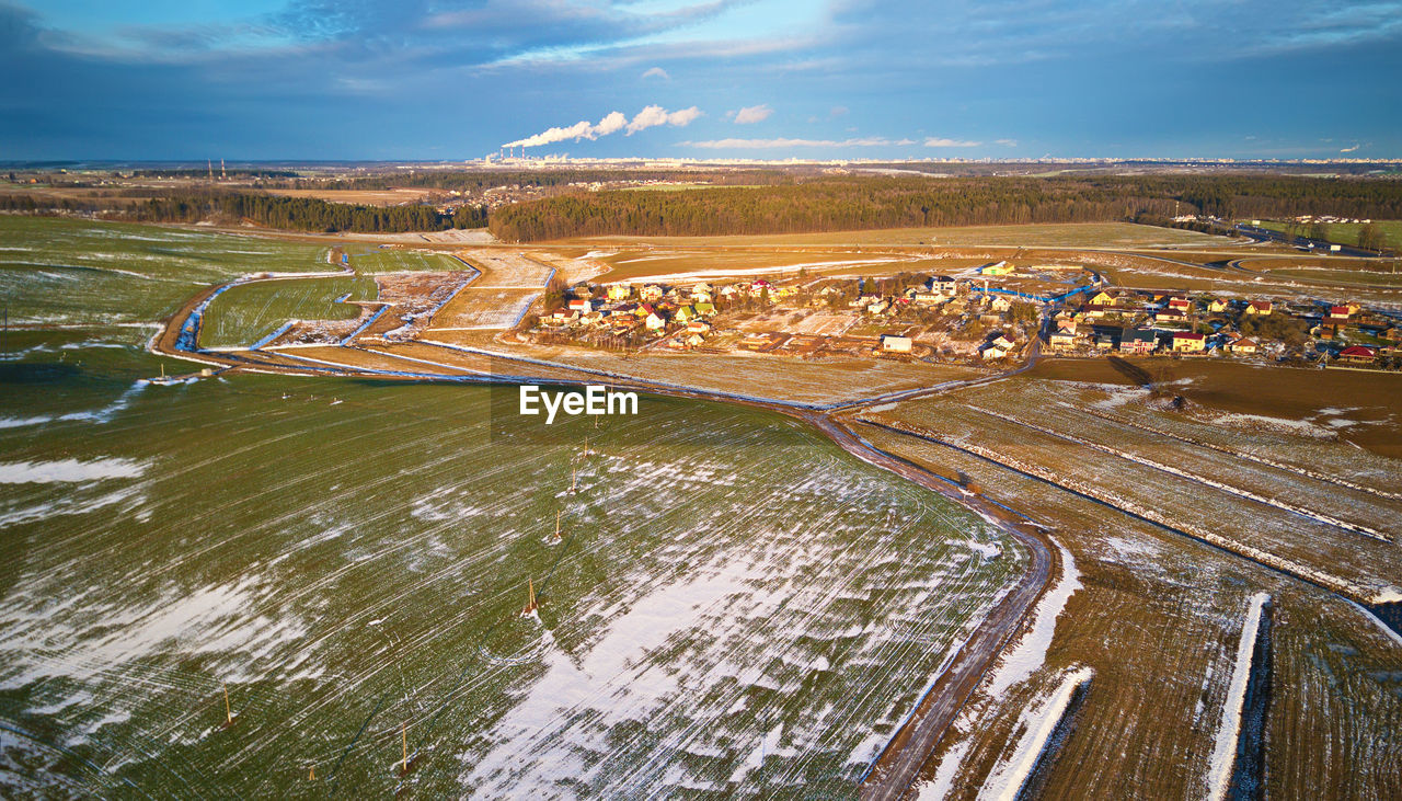 Winter countryside. fields with winter crops plowed field. fields covered snow. aerial view.