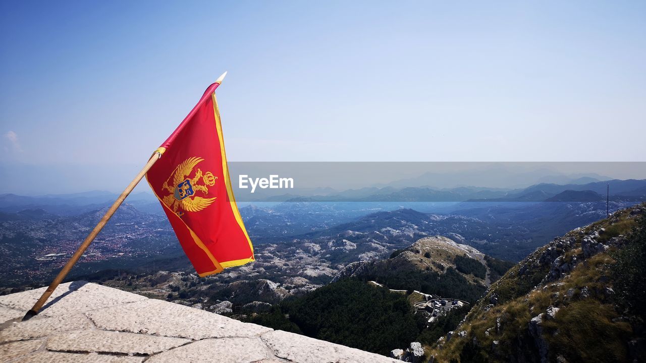 View of the montenegro flag at the njegos mausoleum, lovcen