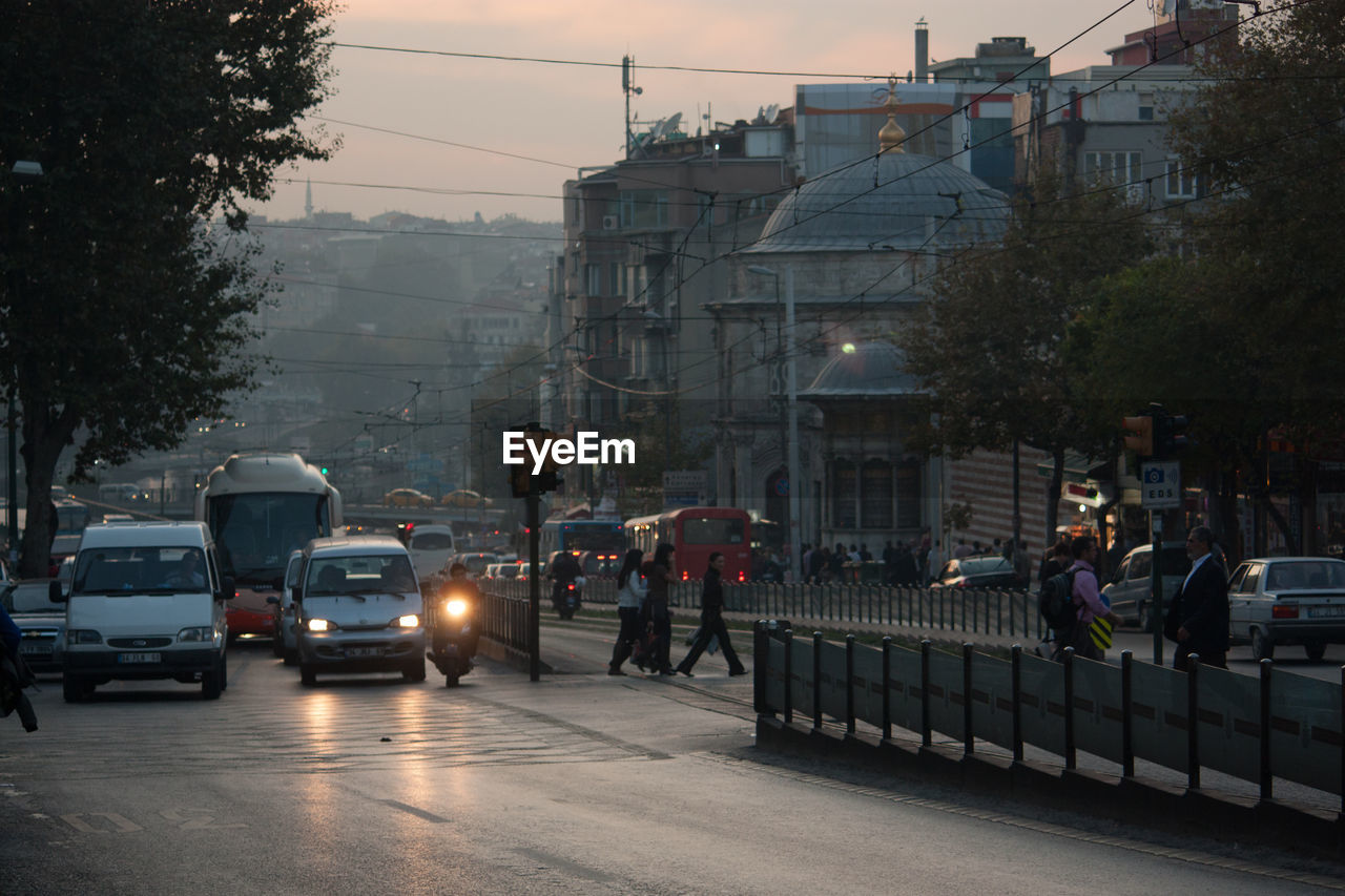 PEOPLE WALKING ON ROAD