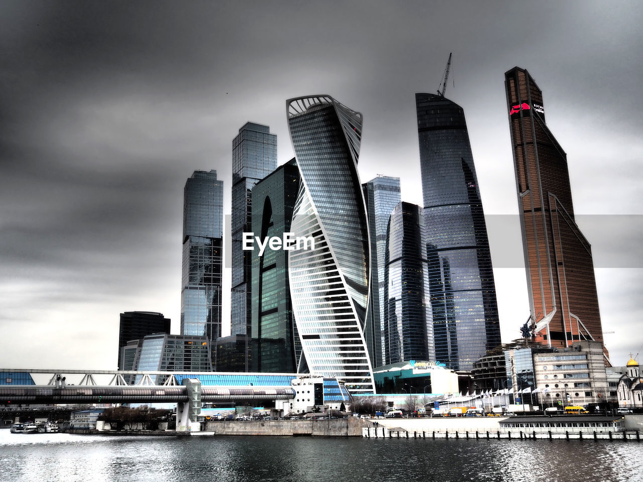 SKYSCRAPERS IN CITY AGAINST SKY