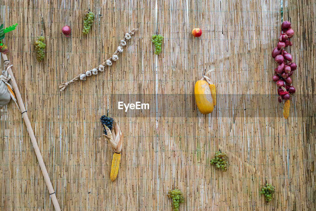 Autumn products on a wicker wall