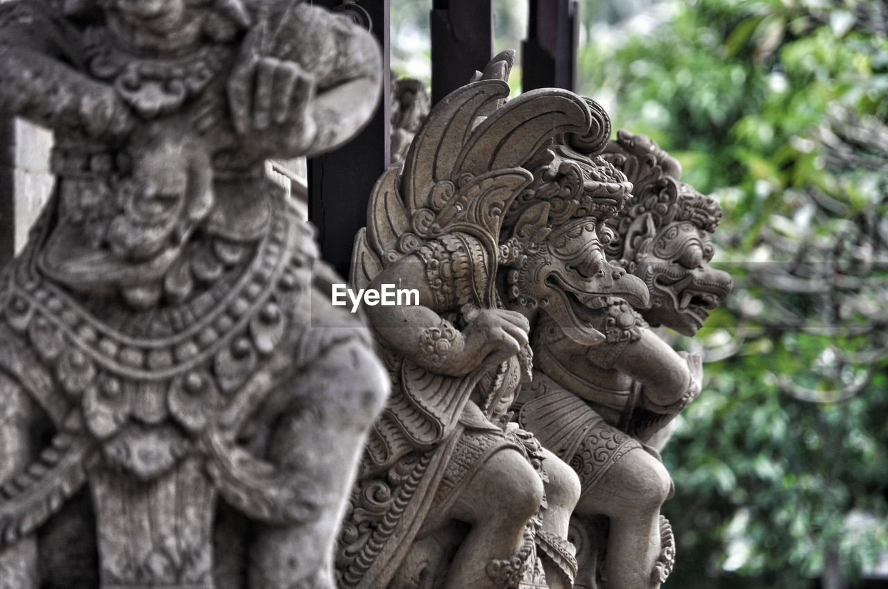 Close-up of sculptures at temple