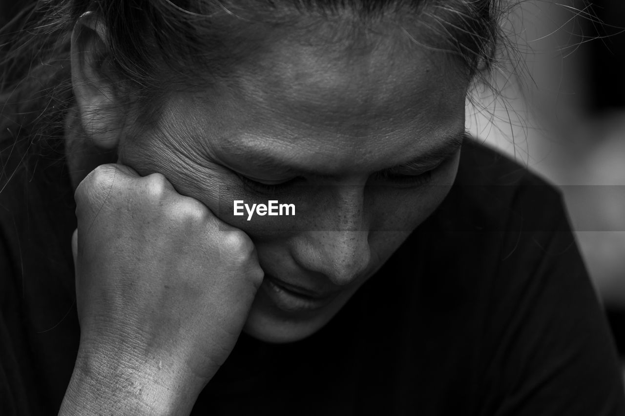 Close-up of thoughtful woman