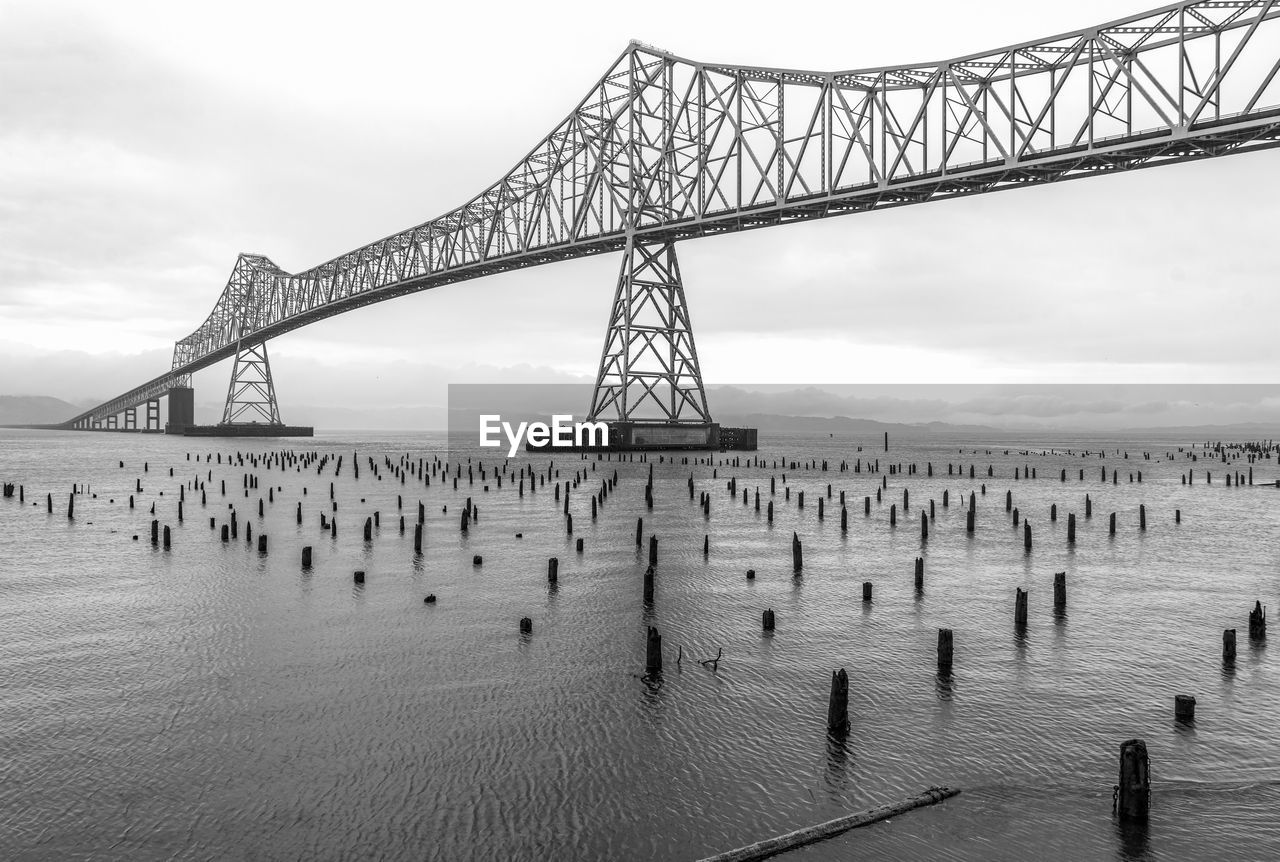 A view of the astoria-megler bridge in oregon state on a moody cloudy day.