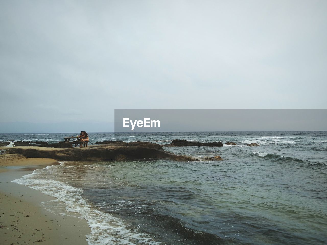 SCENIC VIEW OF BEACH BY SEA AGAINST SKY